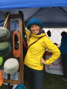 Woman in handmade felted wool hat by Maria Nitzsche of Vermont Hats.